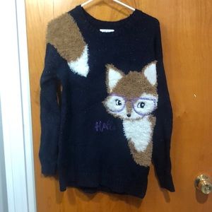 Navy blue sweater with fluffy fox design